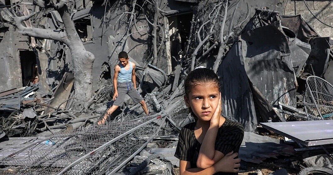A girl looks on as she stands by the rubble outside a building that was hit by Israeli bombardment in Rafah in the southern Gaza Strip, Oct. 31, 2023. (Mohammed Abed/AFP via Getty Images)